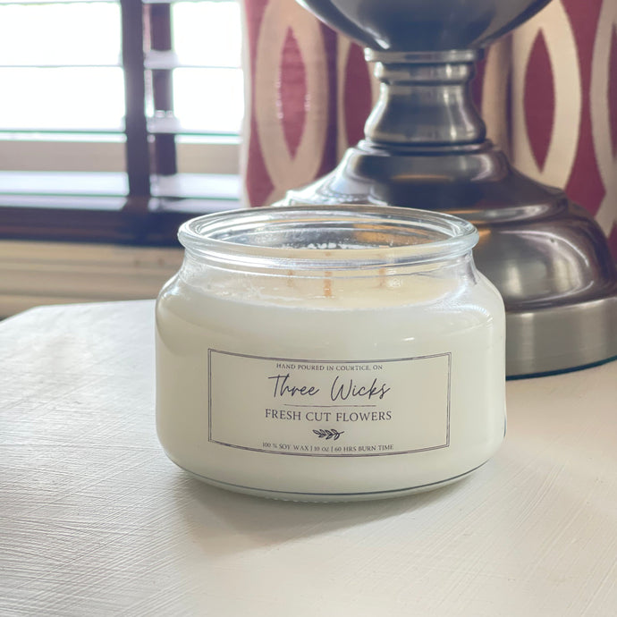 Scented candle made of soy has 3 wicks and is scented with Fresh Cut Flowers from our spring collection