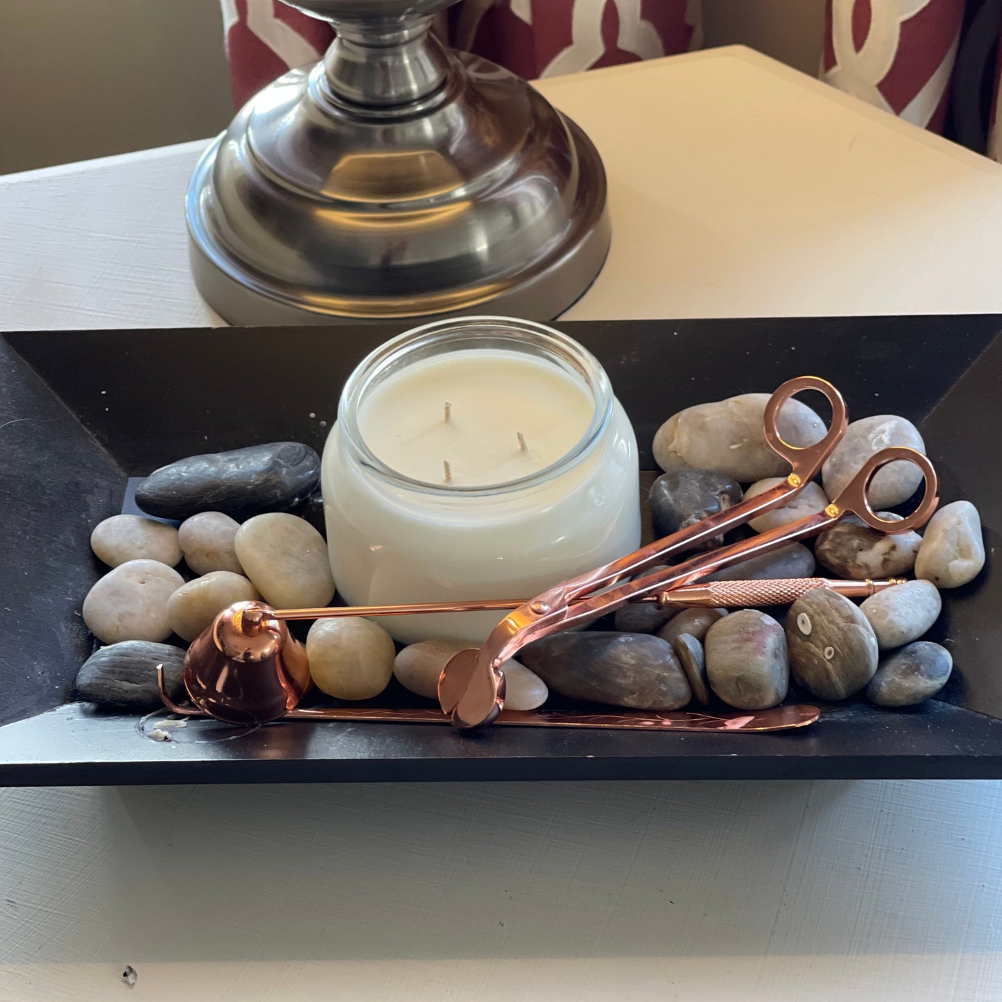 Scented candle made of soy has 3 wicks view from above