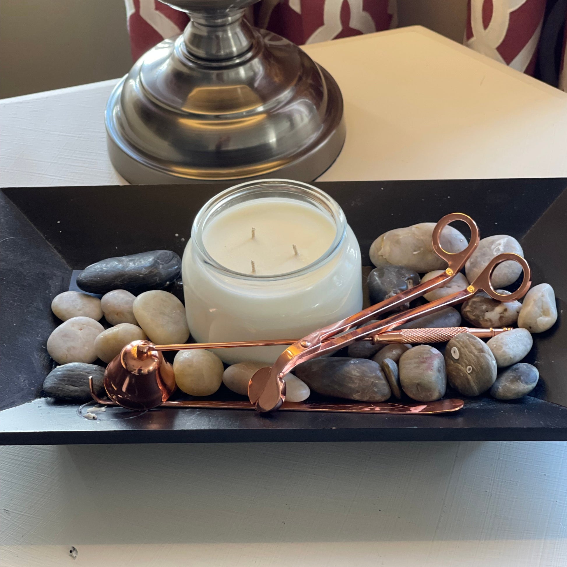 Scented candle made of soy has 3 wicks view from above