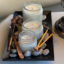 Load image into Gallery viewer, Scented soy candles in a 6oz, 10oz and 16 oz vessel display 

