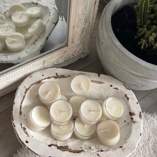 Scented soy tea lights in a bowl