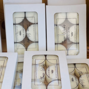 Several different scented tea light packages